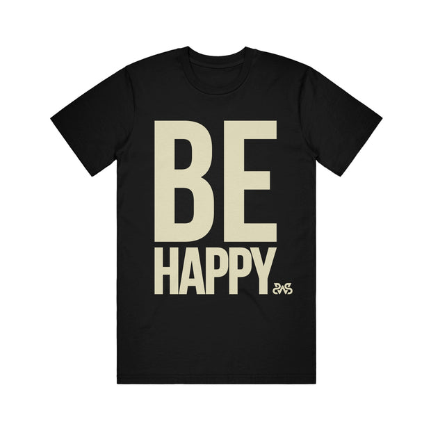 image of the front of a black tee shirt on a white background. tee has full body print in cream that says be happy
