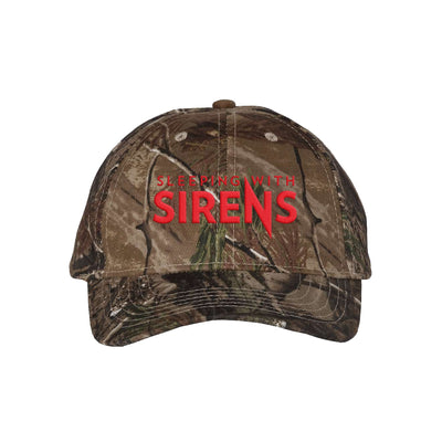 image of a camo hat on a white background. red embroidery across the front of the hat that says sleeping with sirens